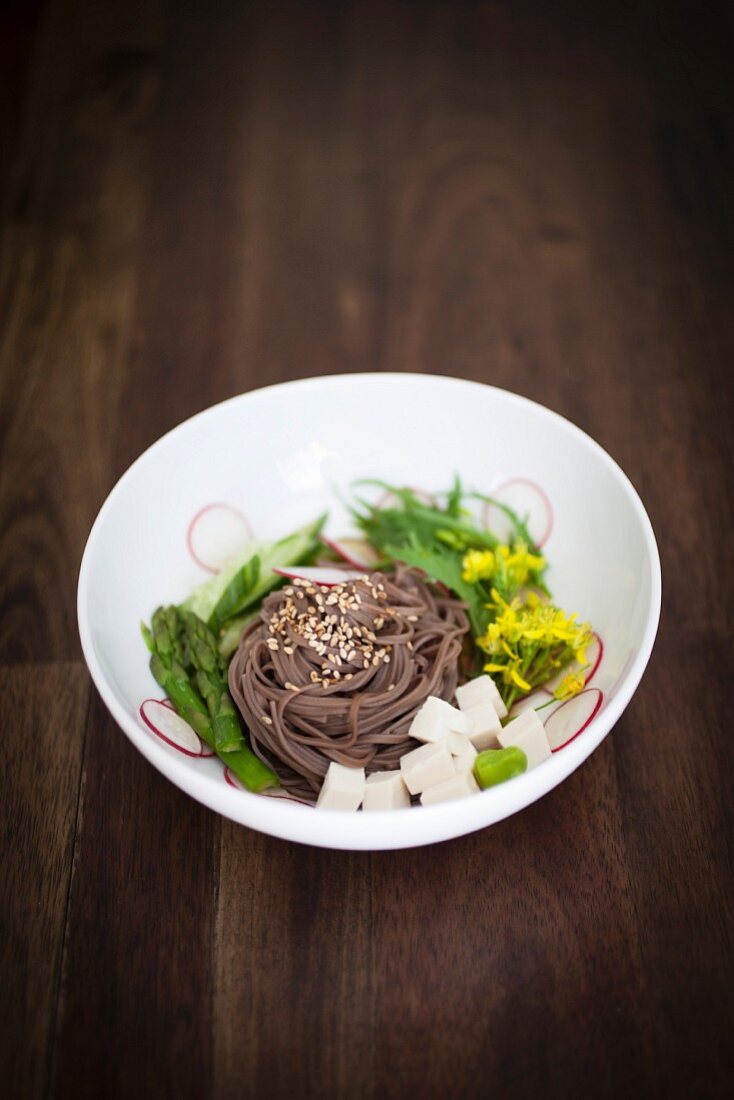 A nest of soba noodles with tofu and asparagus (Japan)