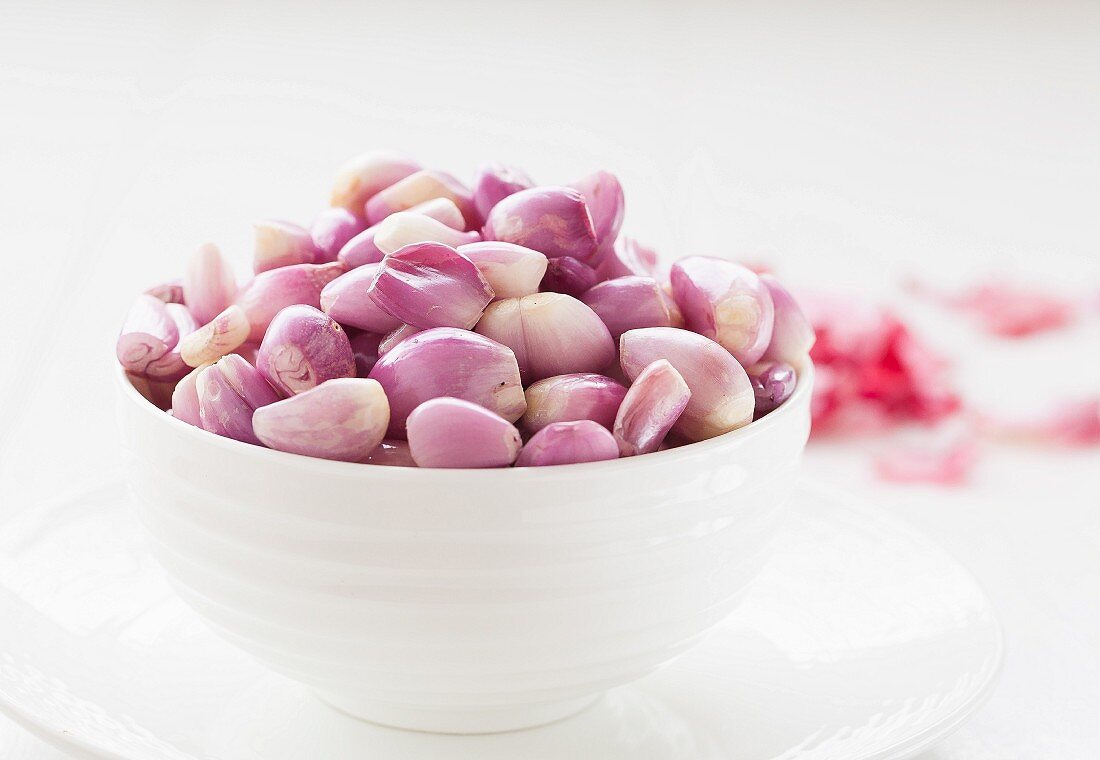 Shallots in a ceramic bowl