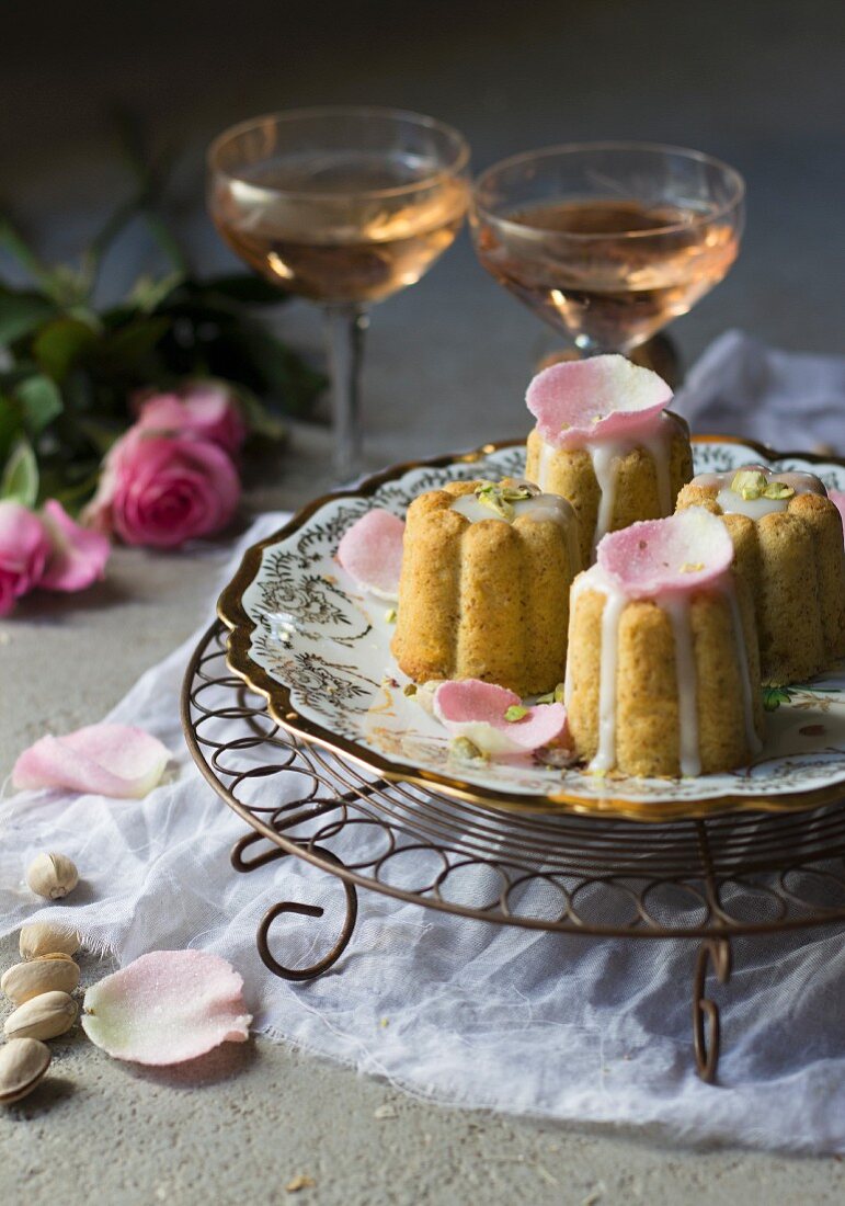Pistachio rose cakes decorated with flower petals
