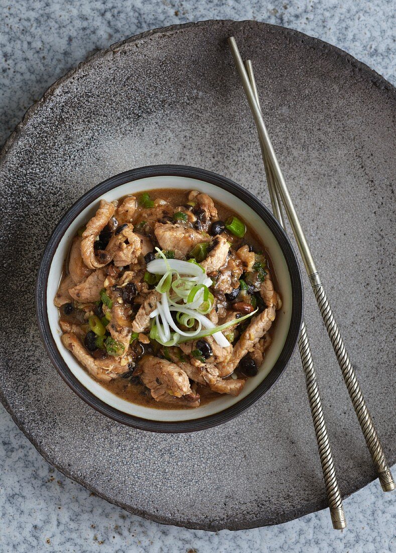 Fried beef with black beans and spring onions (China)