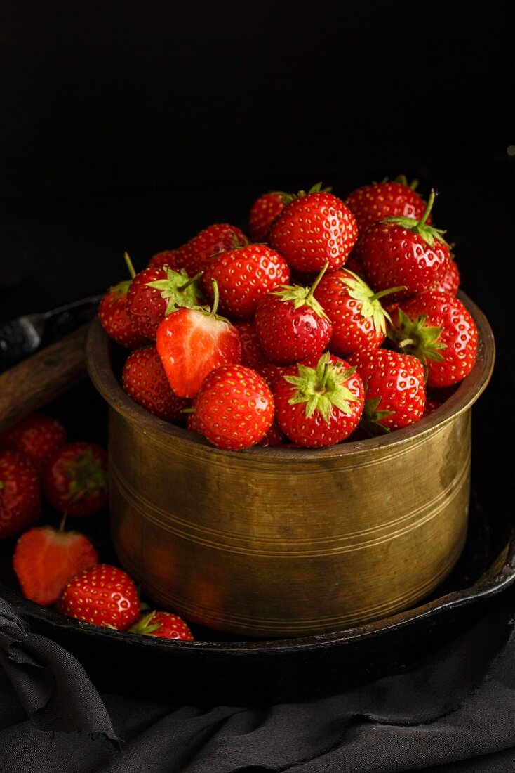 Strawberries in an antique pot