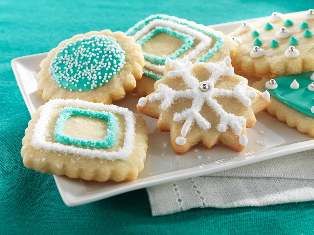 Christmas biscuits decorated with turquoise and white icing