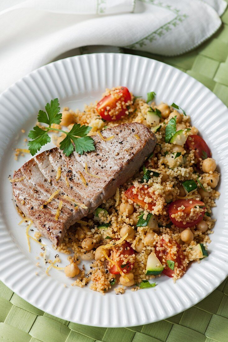 Tuna steaks with spicy chickpea couscous