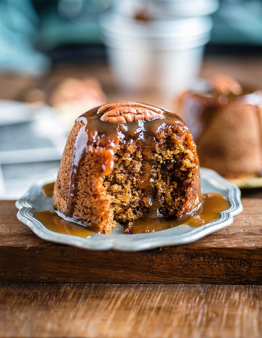 Sticky toffee pudding with dates, ginger and a brandy toffee sauce