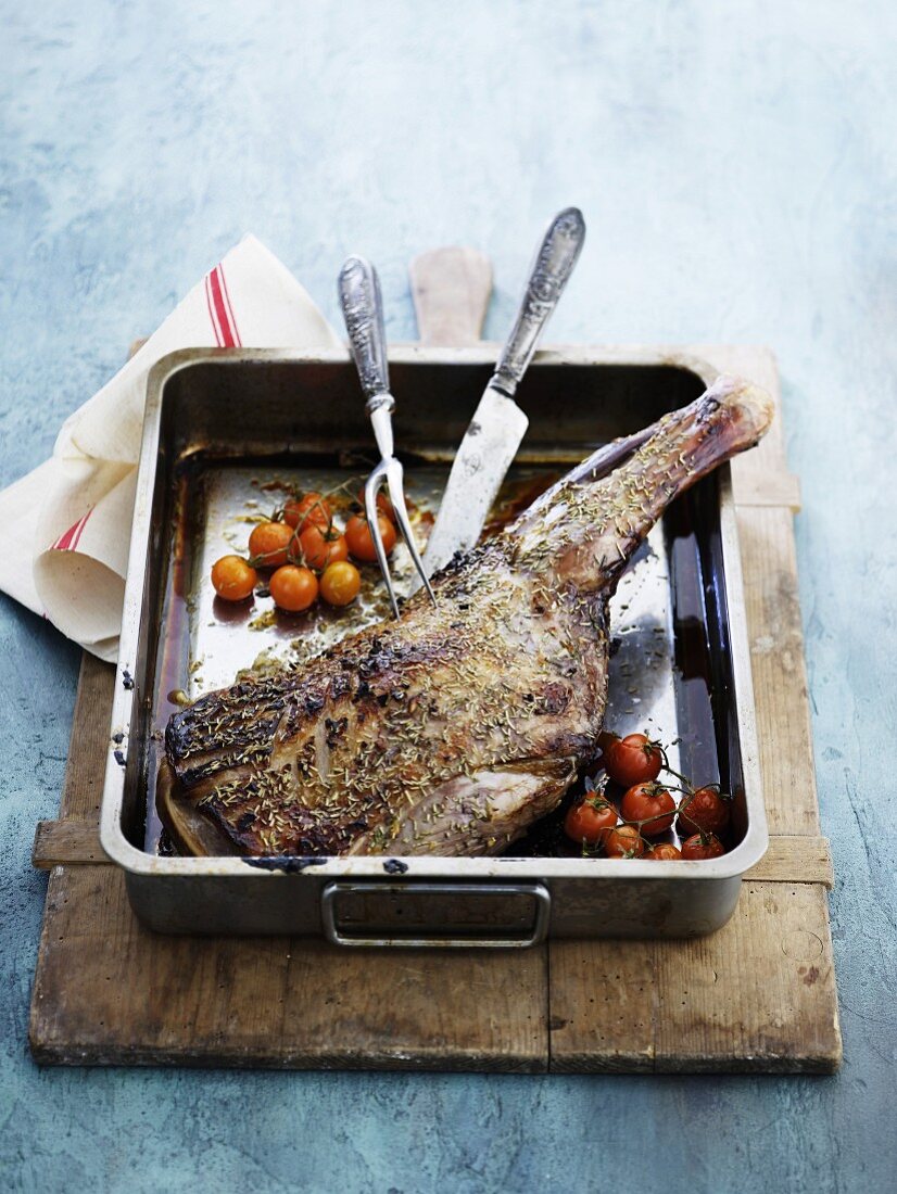 Roasted leg of lamb with cherry tomatoes