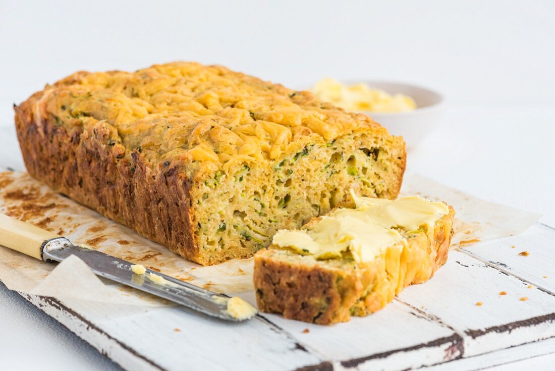 Cheese and courgette bread with herbs, sliced
