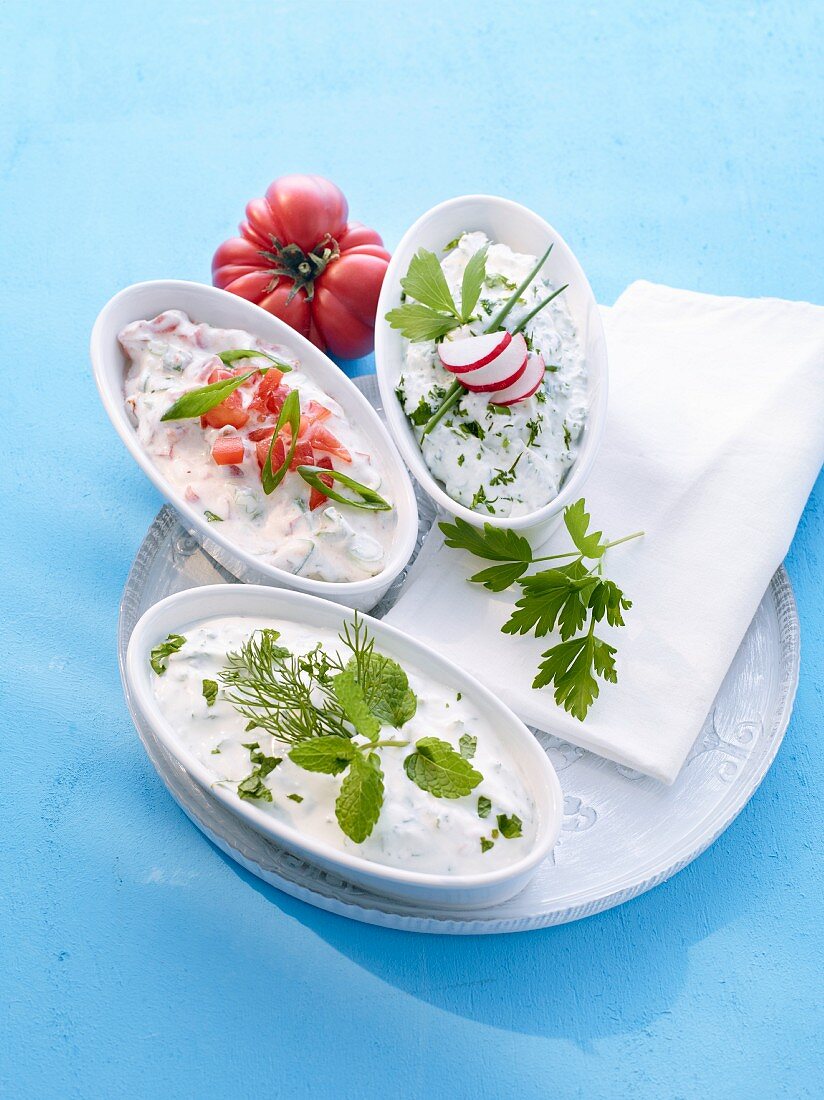 Herb quark with chives, a mint dip and a tomato and yoghurt sauce