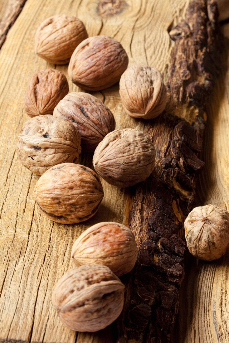 Walnuts on a wooden surface