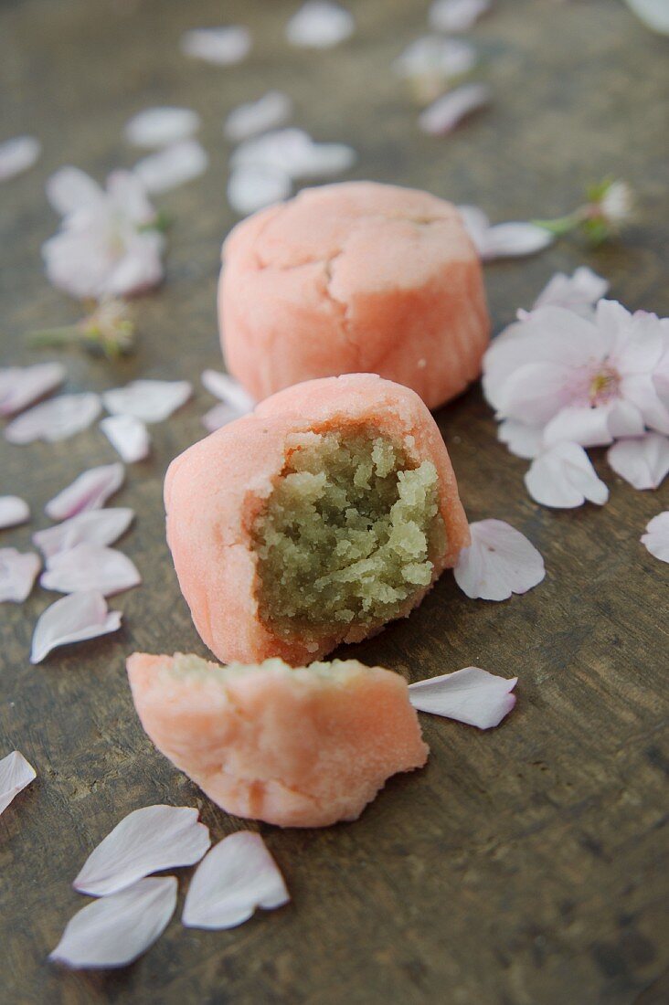 Japanese sweets for cherry blossom festival with scattered cherry blossom