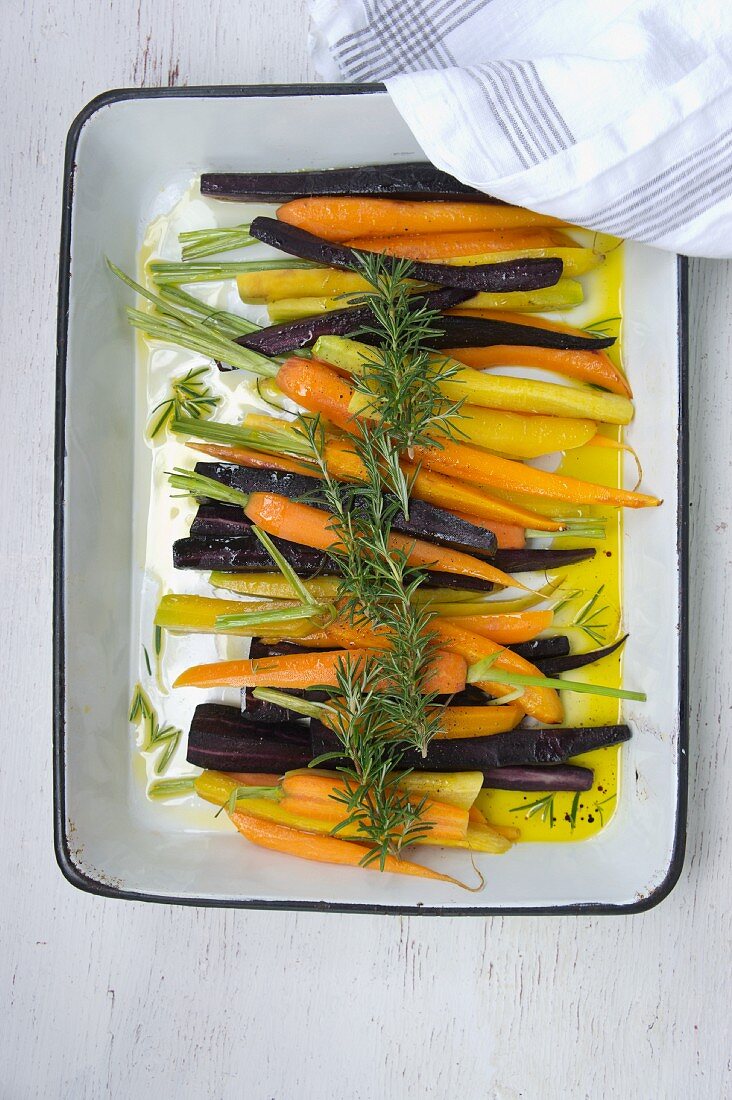 Glazed carrots in a roasting tin