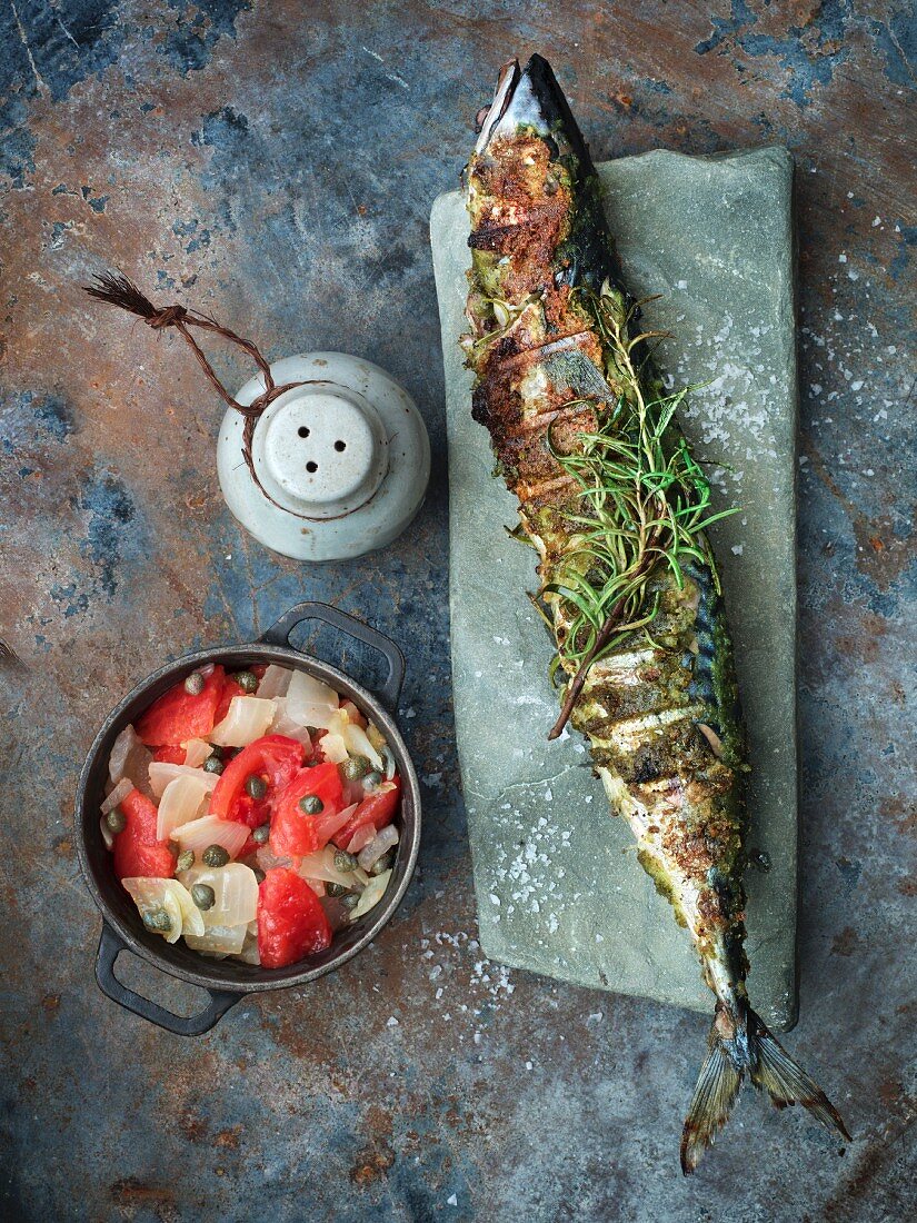 Stuffed grilled mackerel with a vegetables salad