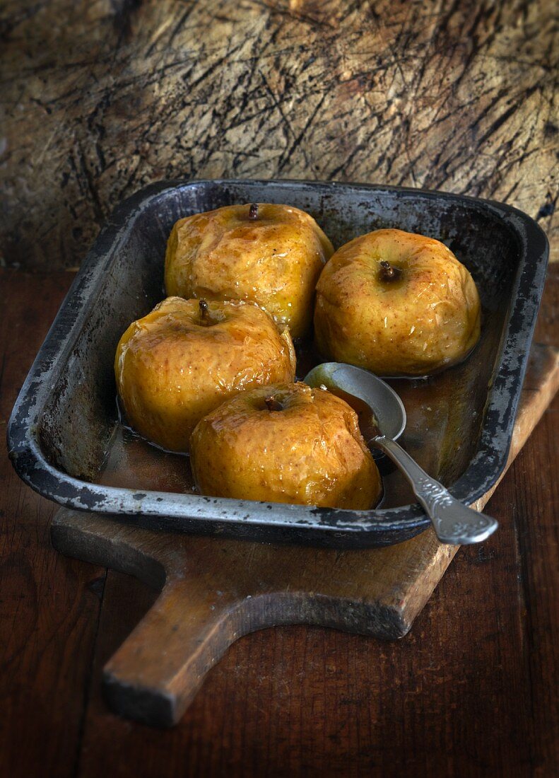 Baked apples in an old baking tin