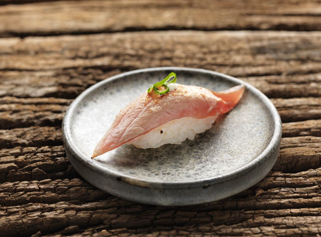 Nigiri sushi with fried tuna fish