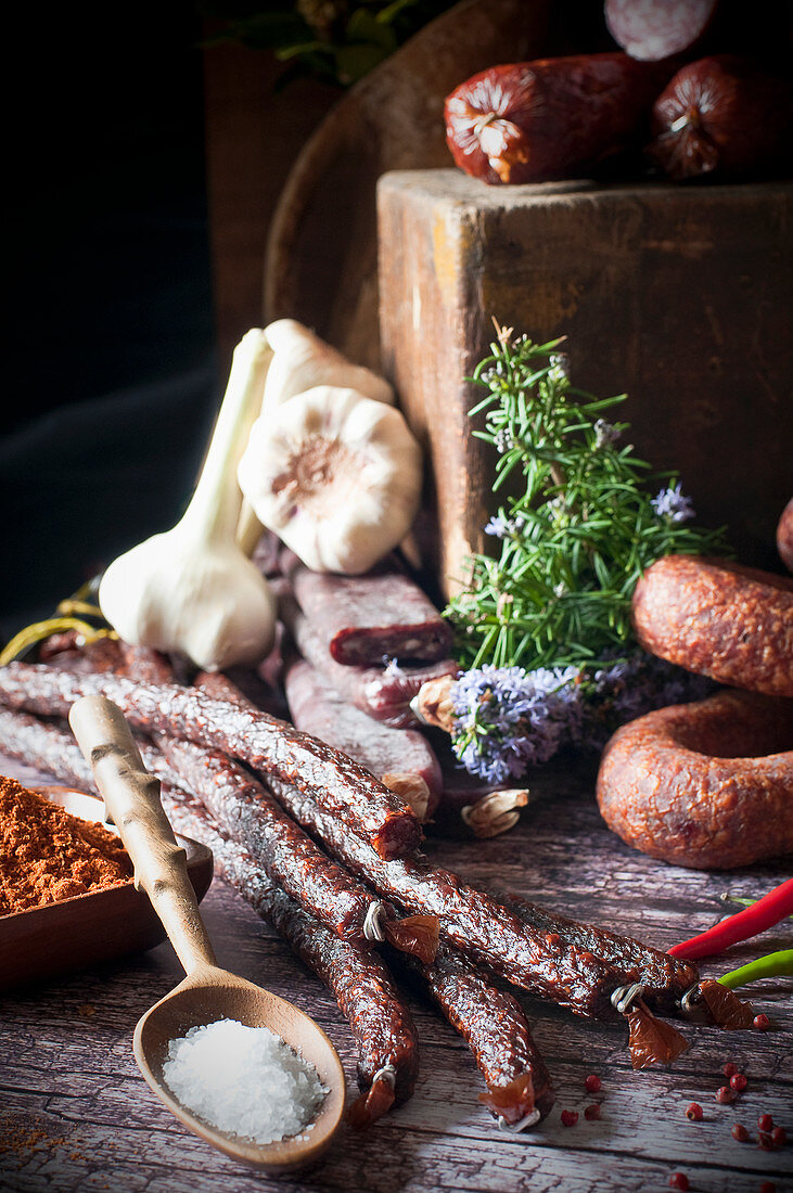 An arrangement of smoked and dried red venison sausages
