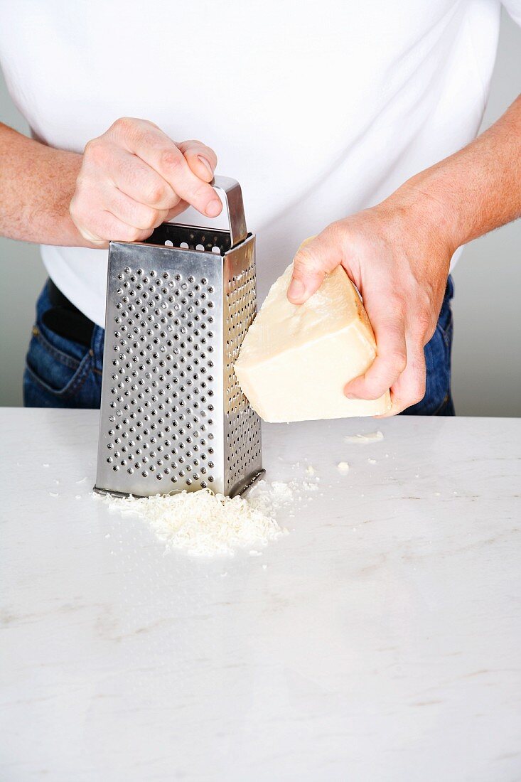 Parmesan cheese being grated