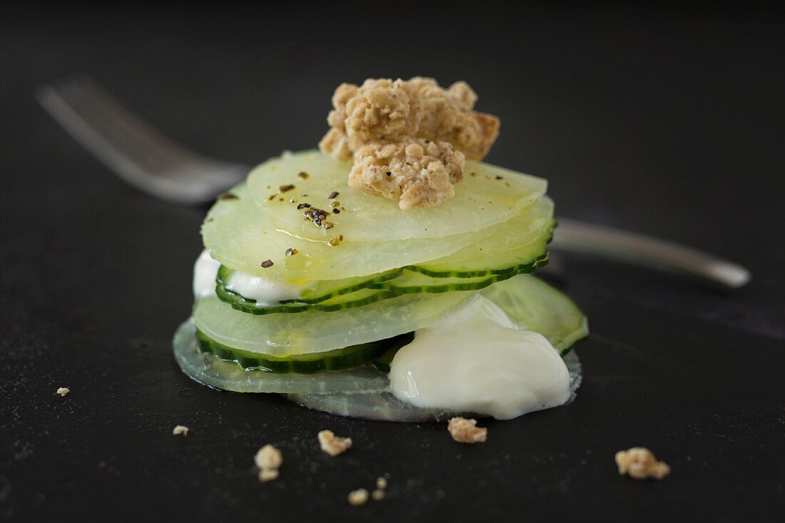 Cucumber and celery salad with soya yoghurt and almond crispies