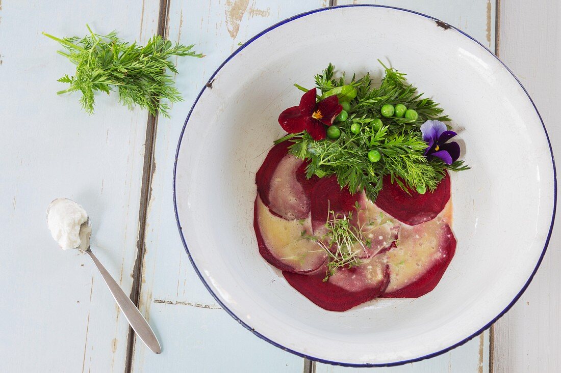 Beetroot carpaccio with a herb salad