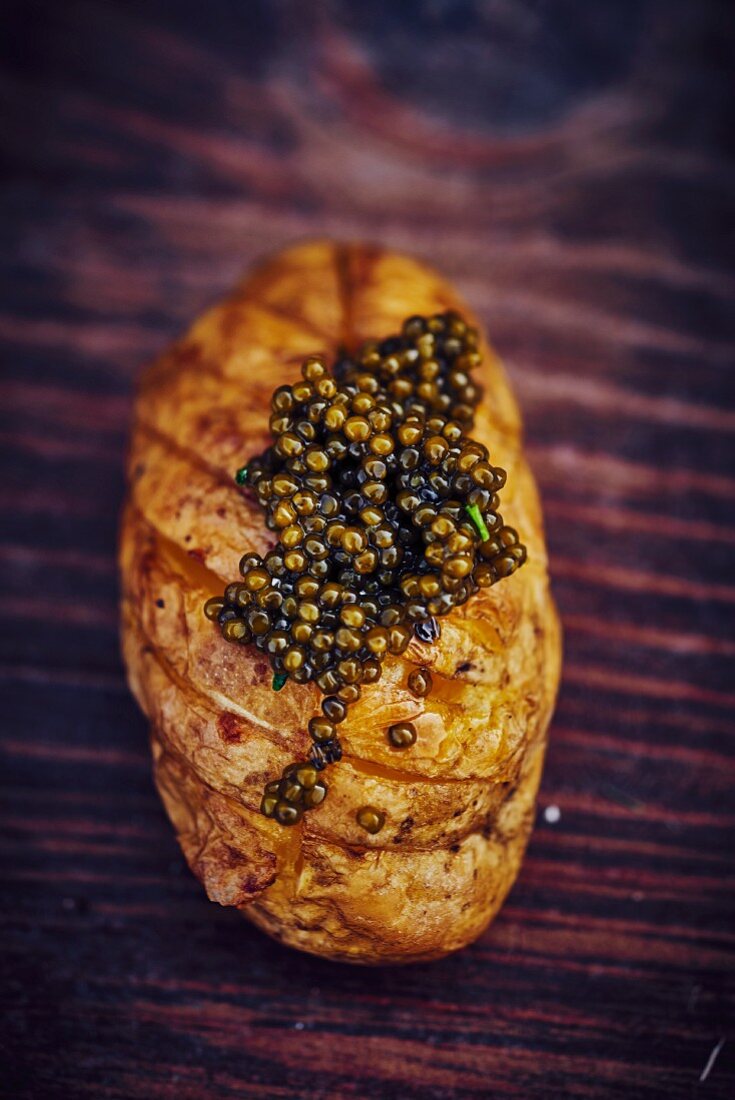 A baked potato with caviar