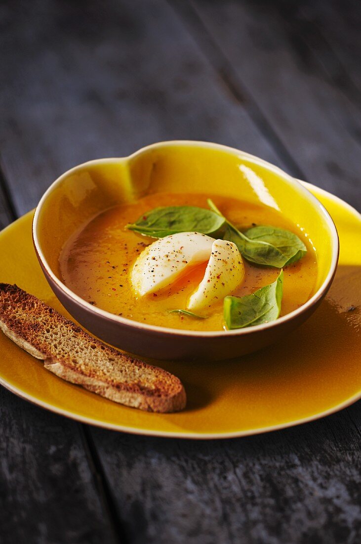 Vegetable soup with poached egg