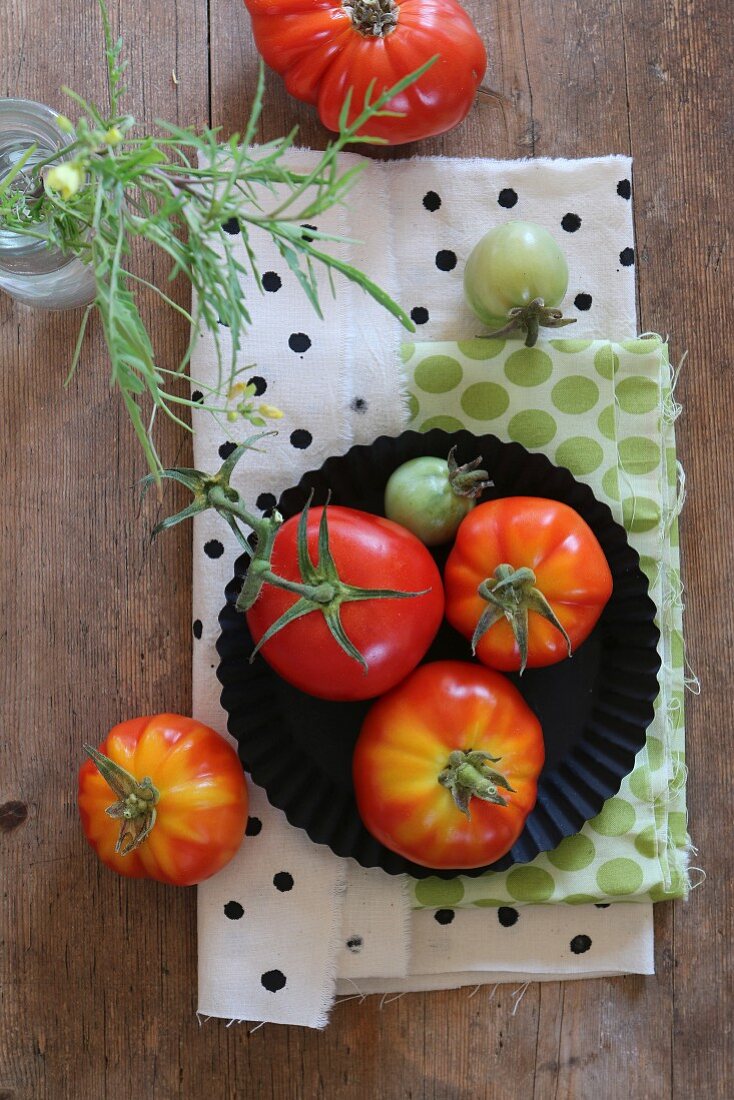 An arrangement of fresh garden tomatoes