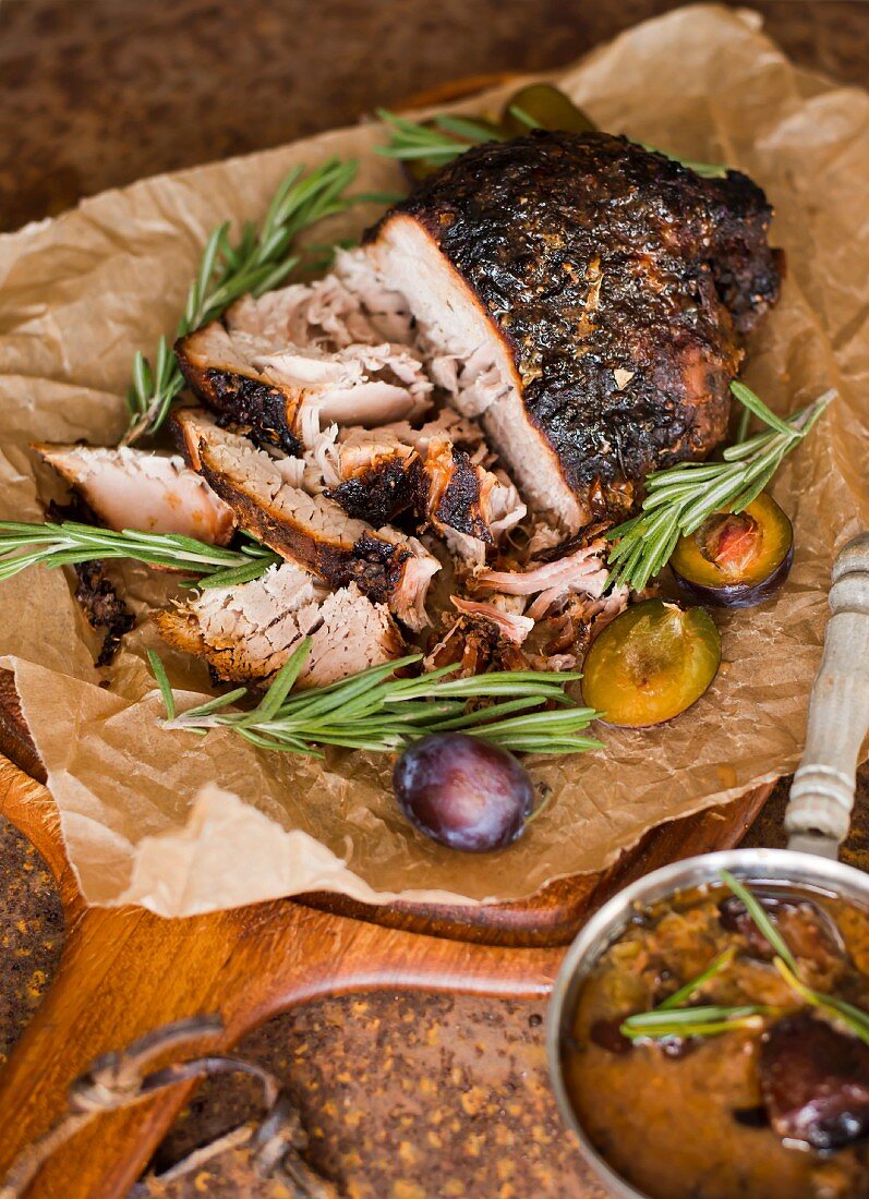 Roast ham with rosemary and plums