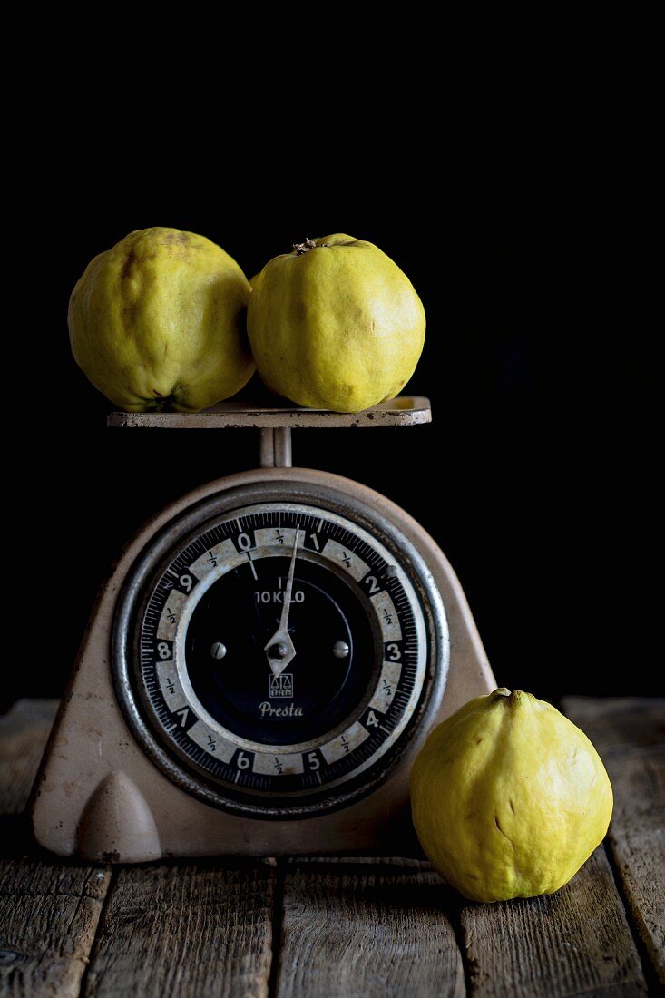 Quinces on a pair of retro scales