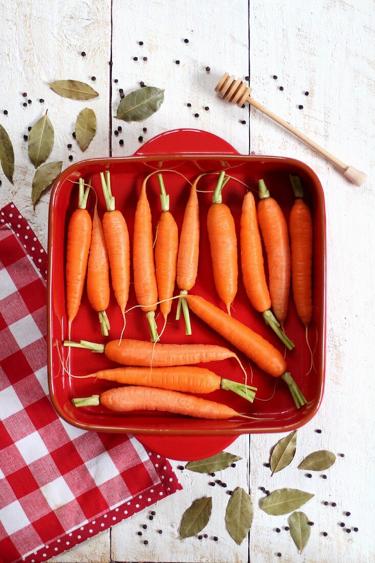 Carrots in a red baking dish