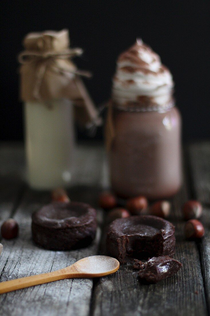 Chocolate cakes, hazelnuts and drinking chocolate