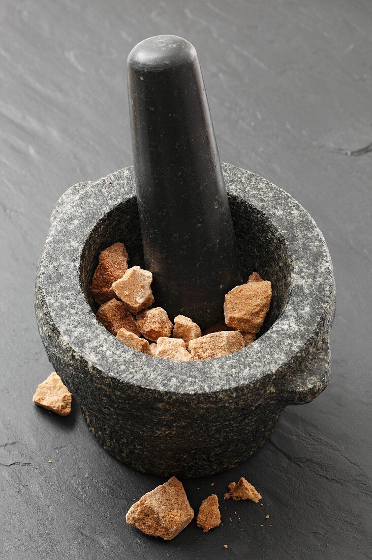 Coconut flower sugar in a mortar