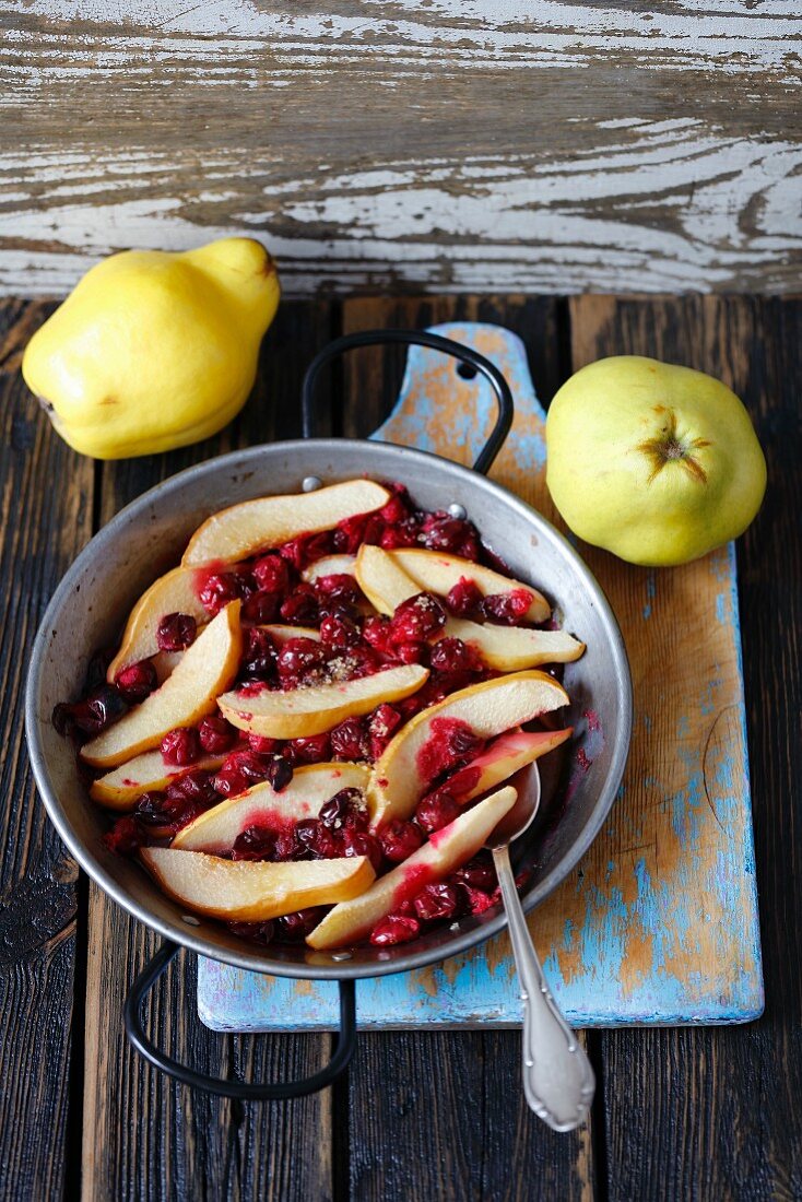 Quince baked with lingonberries