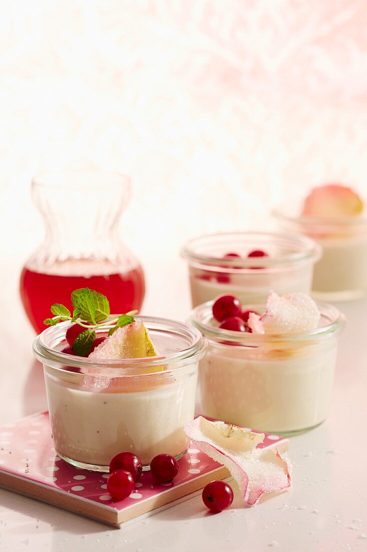 Panna cotta with rose petal syrup and candied rose petals