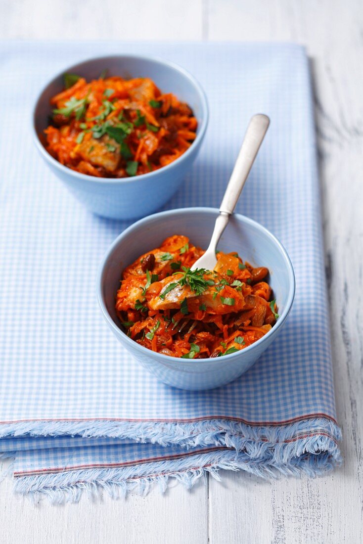 Herring salad with carrots, raisins and curry