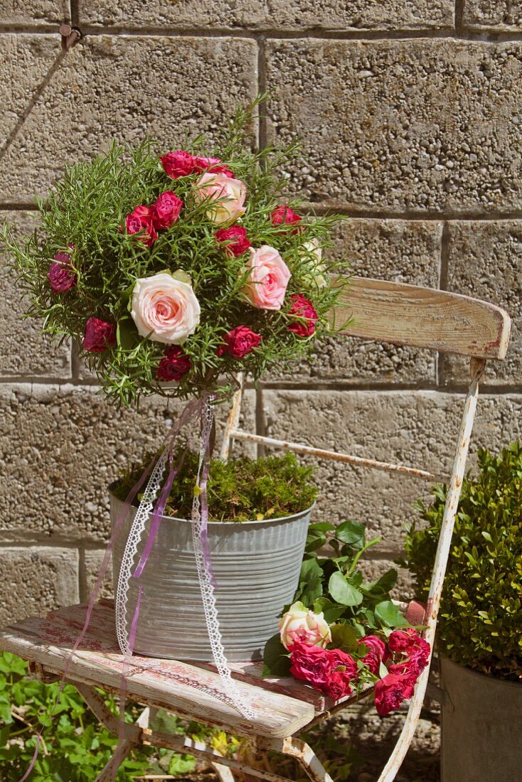 Standard rosemary decorated with roses