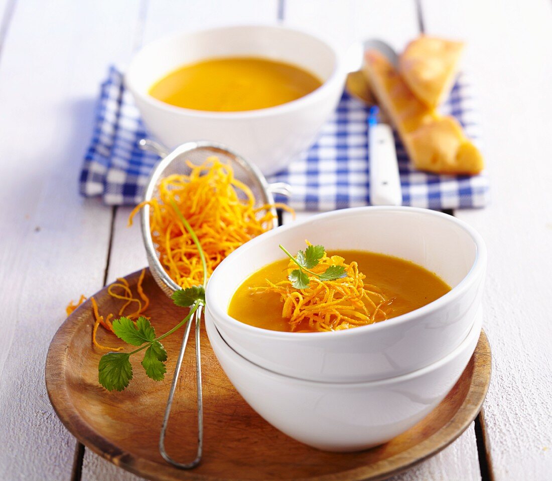 Papaya and carrot soup with carrots straw