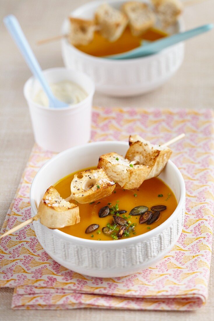 Pumpkin and parsnip soup with bread skewers