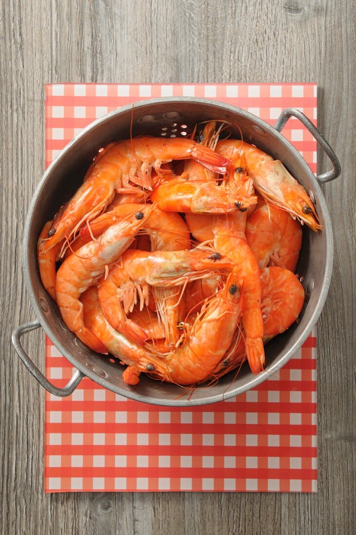 Fresh prawns in a colander