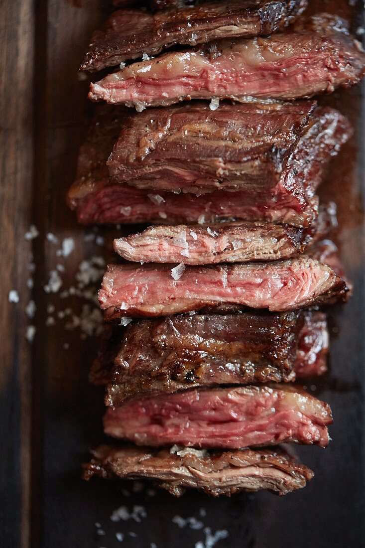 Beef steak with salt, sliced