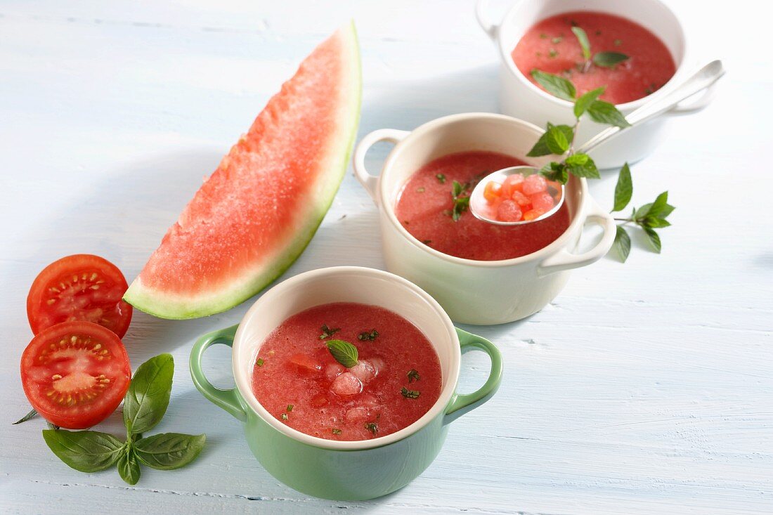 Cold spicy melon soup with chilli and diced tomatoes