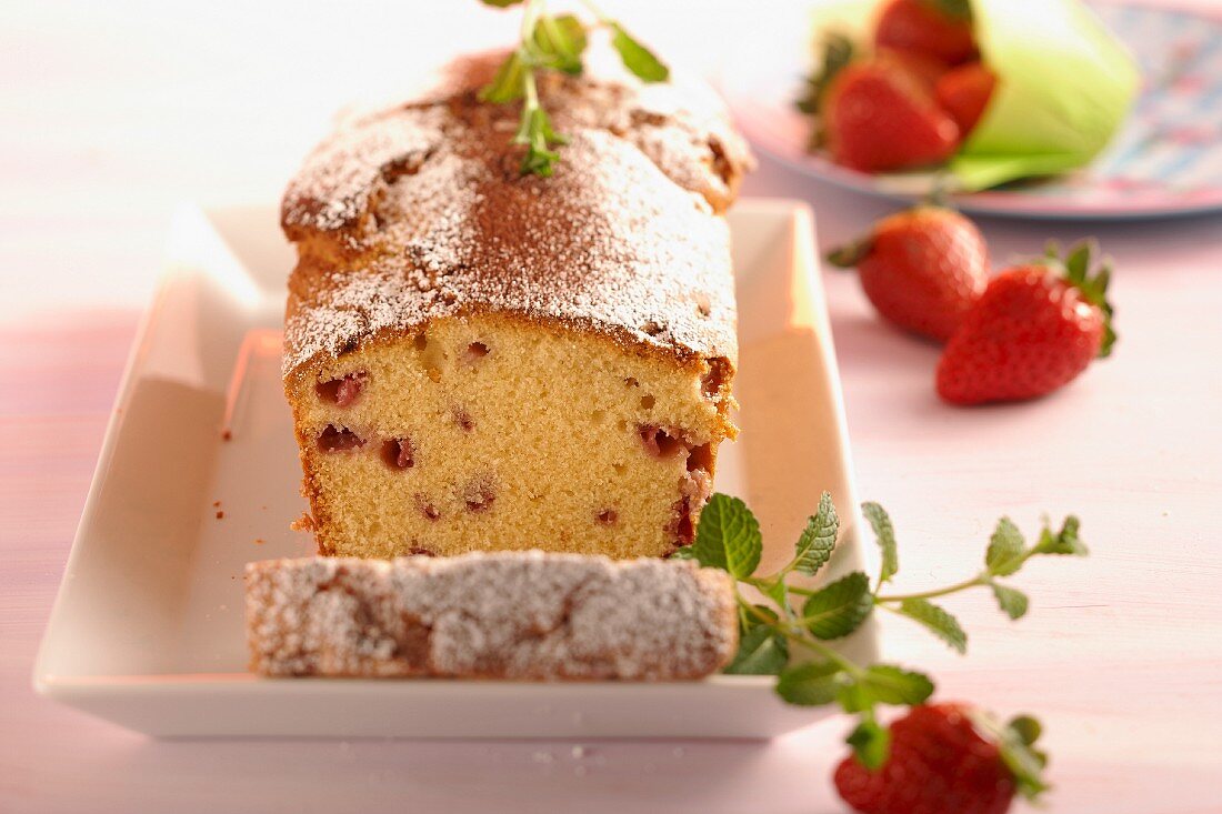 A loaf cake with strawberries and marzipan