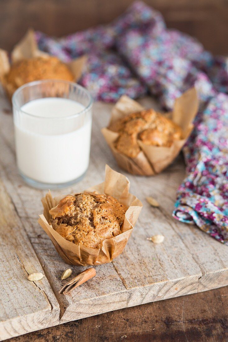 Apple and cinnamon muffins and a glass of milk