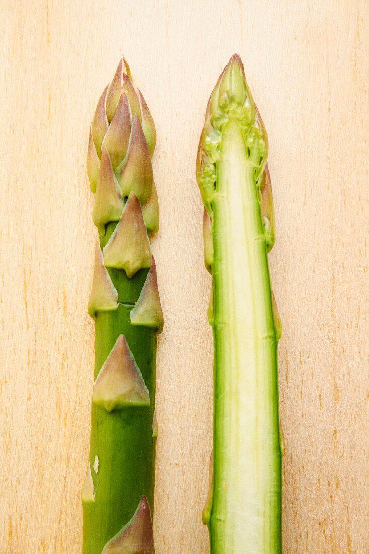 A halved spear of green asparagus