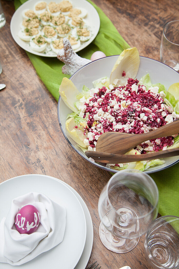 Beetroot salad with goat's cheese, chicory and pomegranate seeds for an Easter lunch