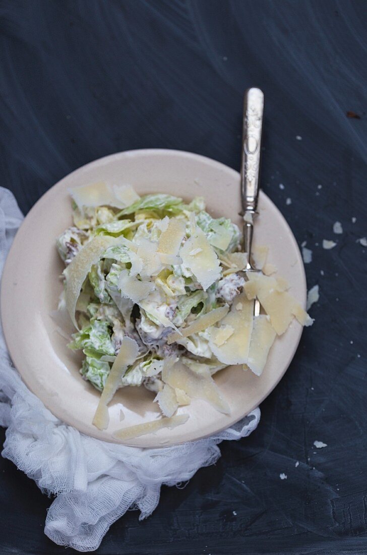 Caesar salad with Parmesan cheese (seen from above)