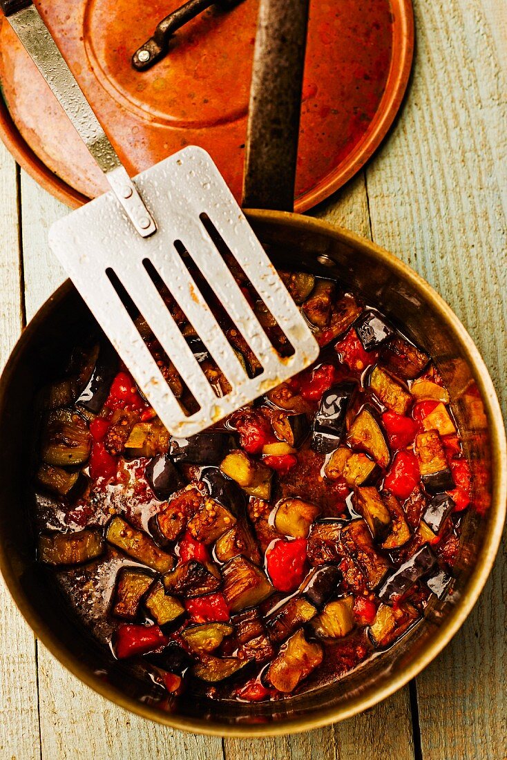 Aubergine and tomato sauce in a pan