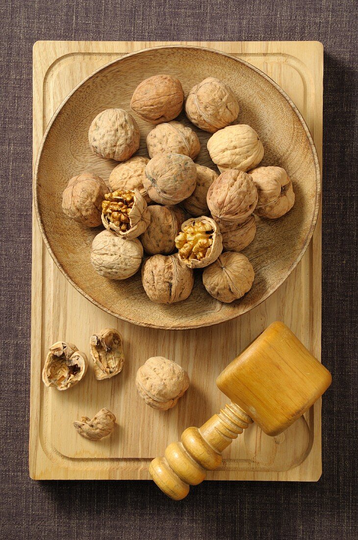 Walnuts, unshelled and cracked open