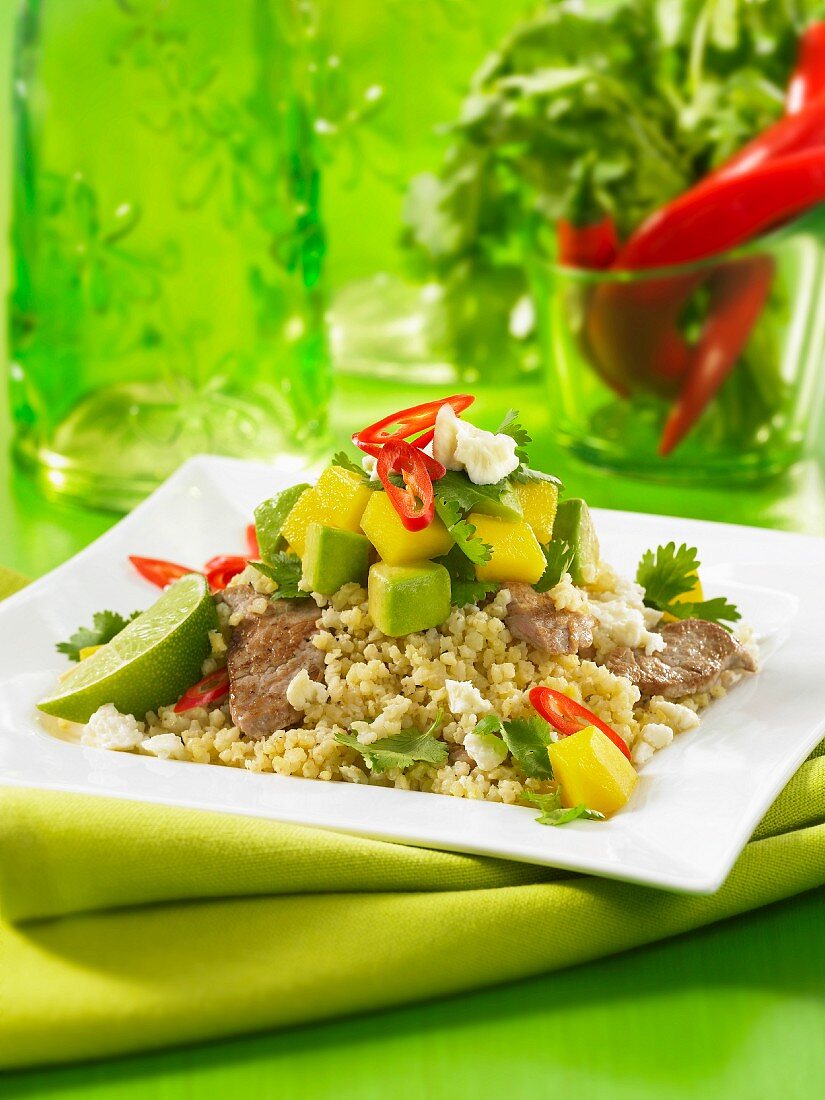 Millet with pork, avocado, mango and chilli