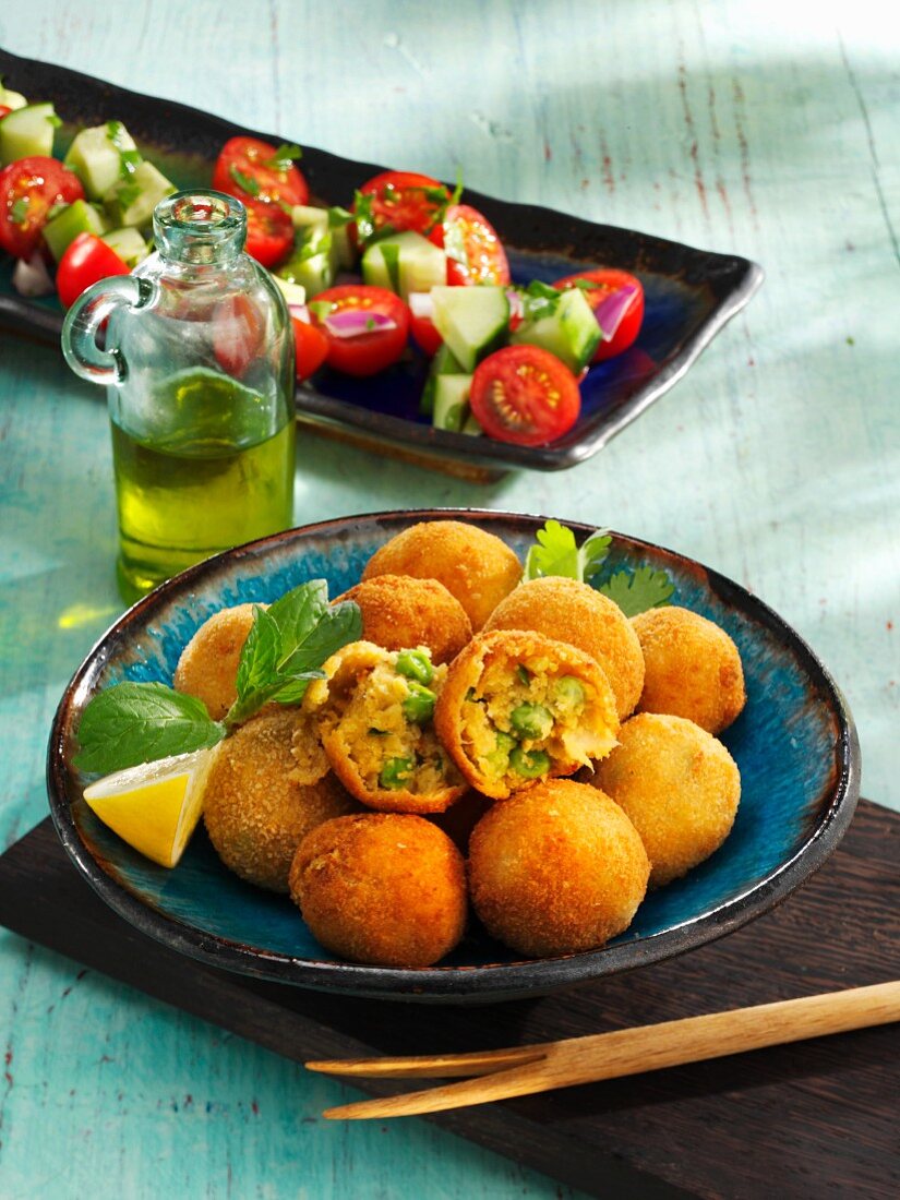Fried chickpea balls with peas