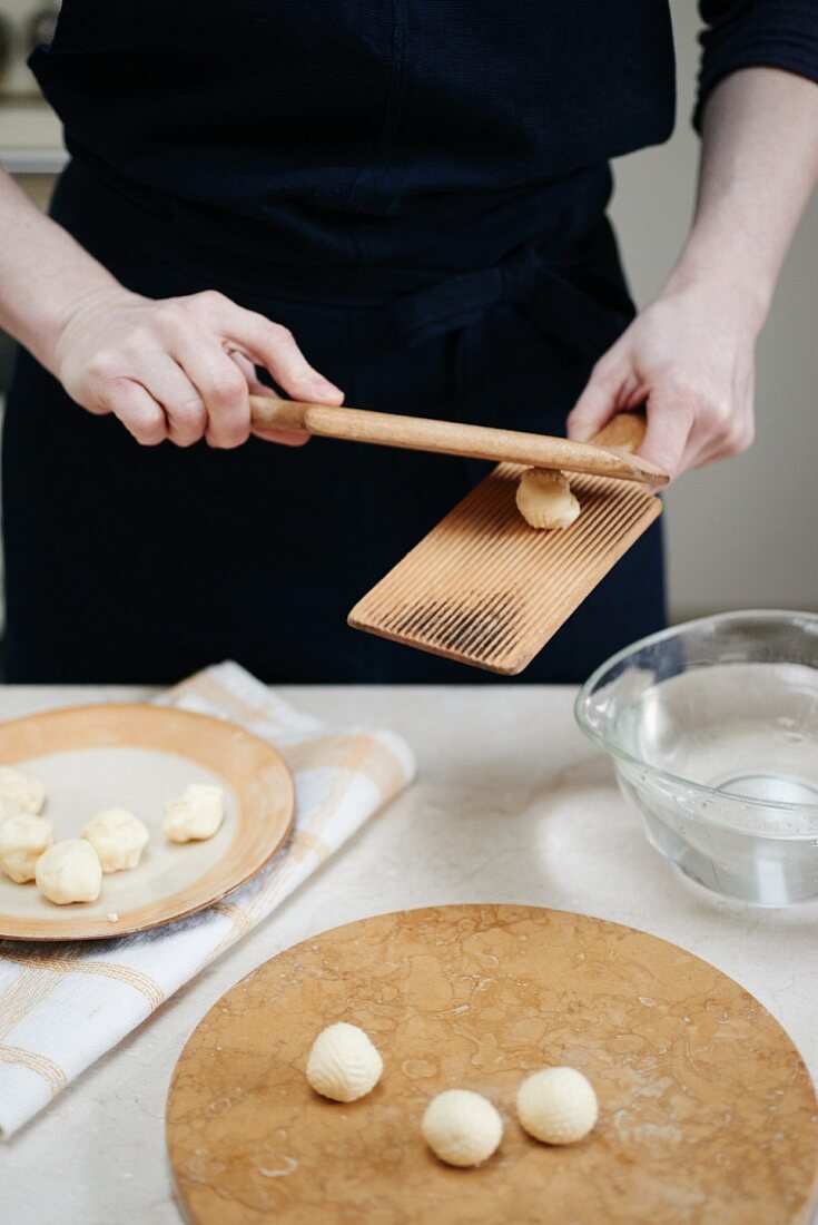 Homemade butter being shaped into balls