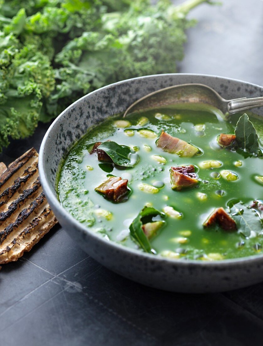 Green kale soup with bacon and white beans