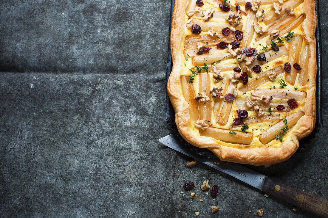 Black salsify tart with cranberries and walnuts